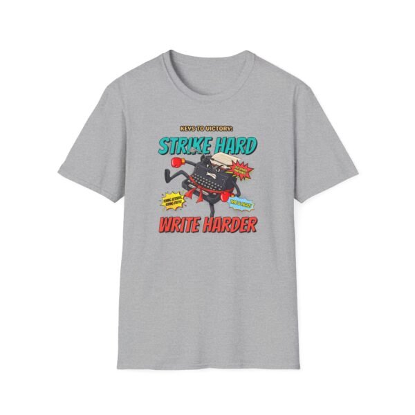 Strike Hard Write Harder Tee in gray folded on table